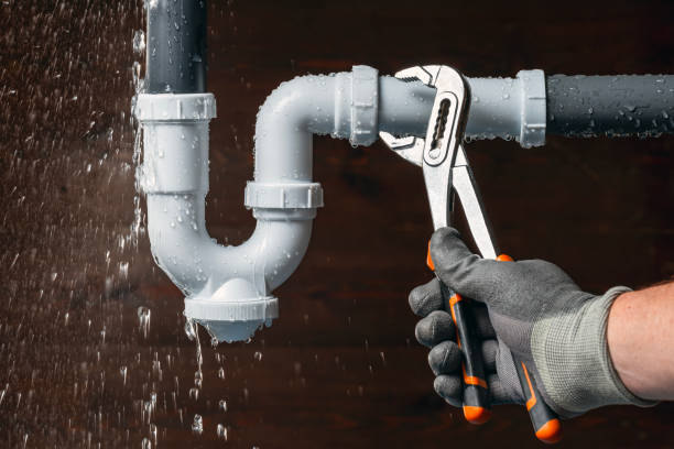 Professional Plumbing technician working in Trumbauersville, PA